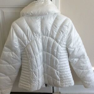Women’s white Guess jacket.